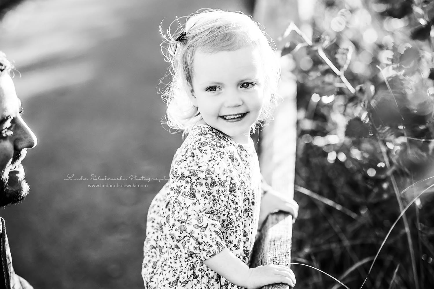 black and white portrait of little girl at the beach, CT Shoreline Family Photographer