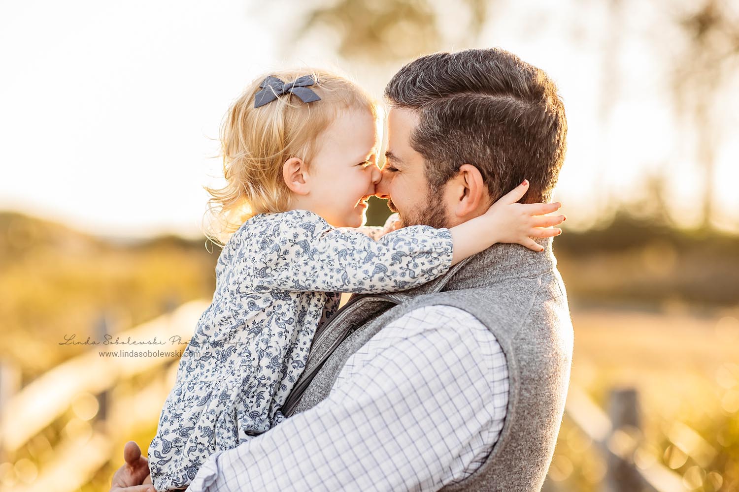 daddy hugging his little girl, CT Shoreline family photographer