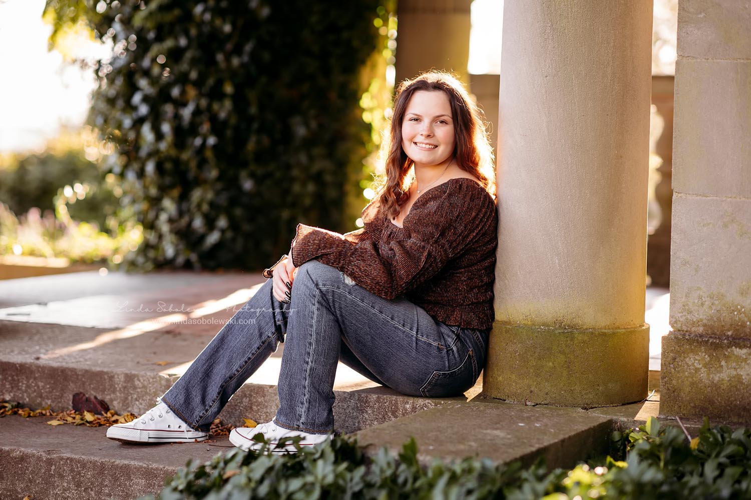 girl in brown sweater sitting on a step, CT's Best high school senior photographer