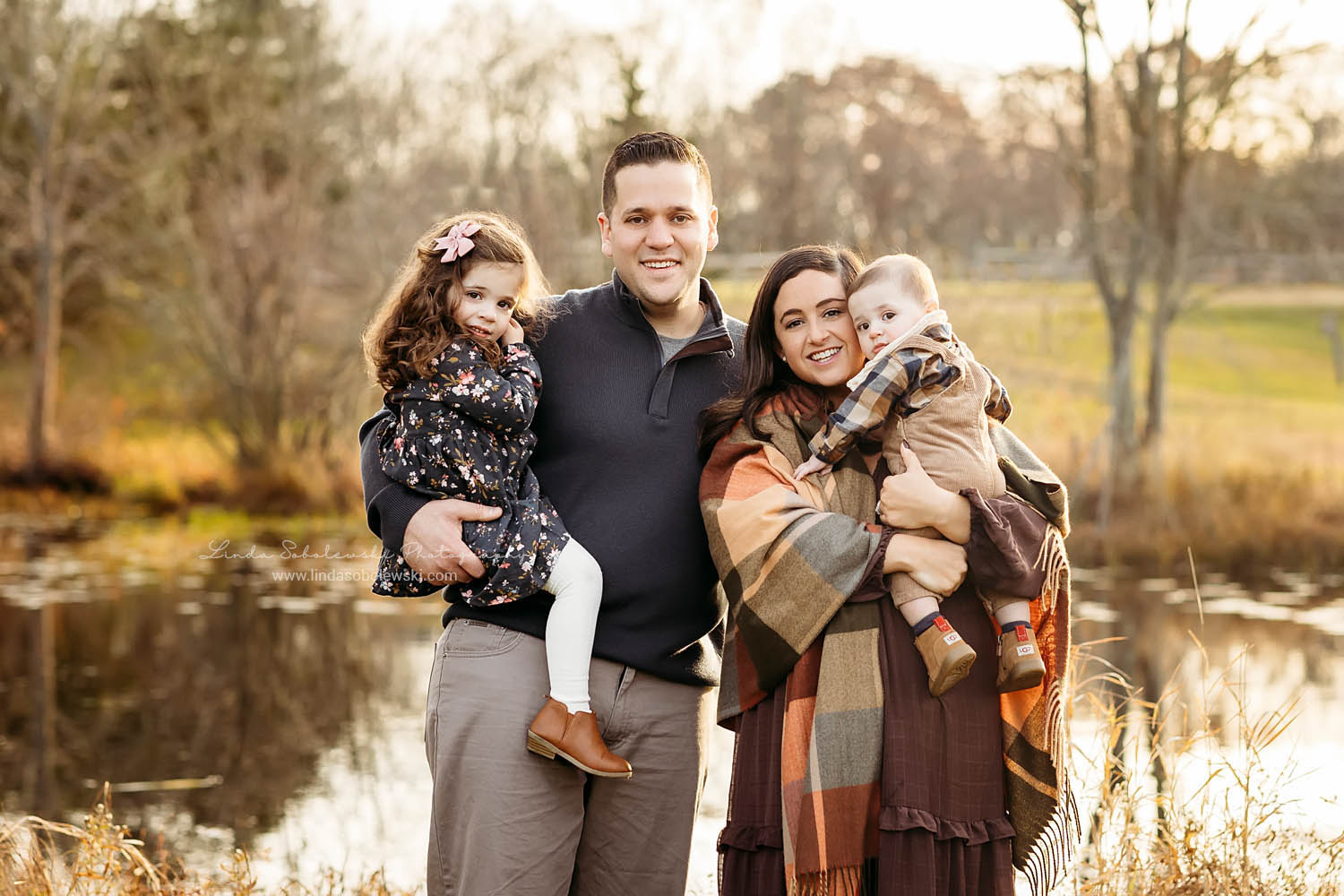 family of four laughing together, Branford CT family photographer