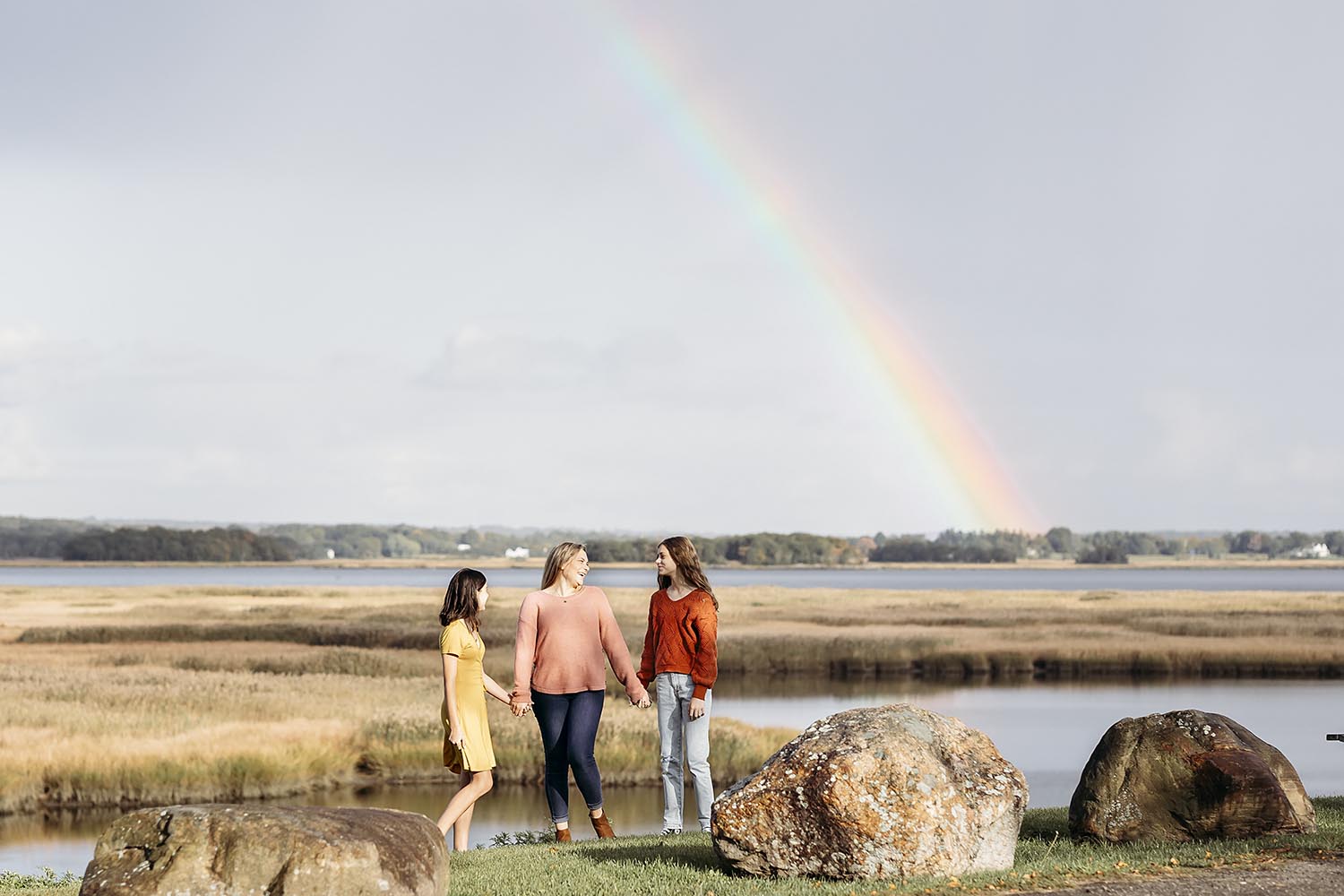 mother and her two teenage daughters standing in front of a rainbow, CT Family, Newborn and Senior Photographer