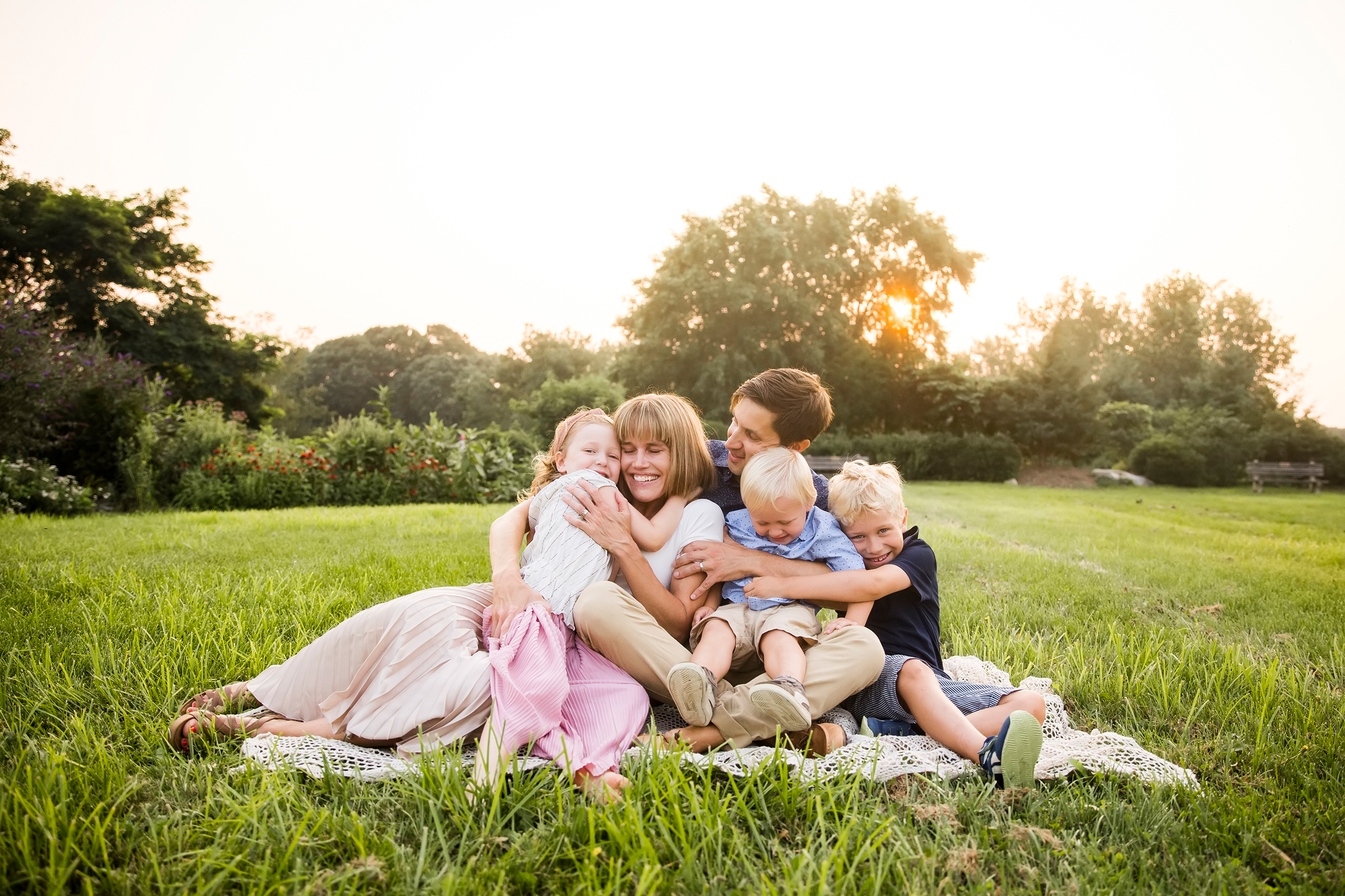 Family of five snuggling together, Westbrook, CT lifestyle photographer, What not to wear for family photos
