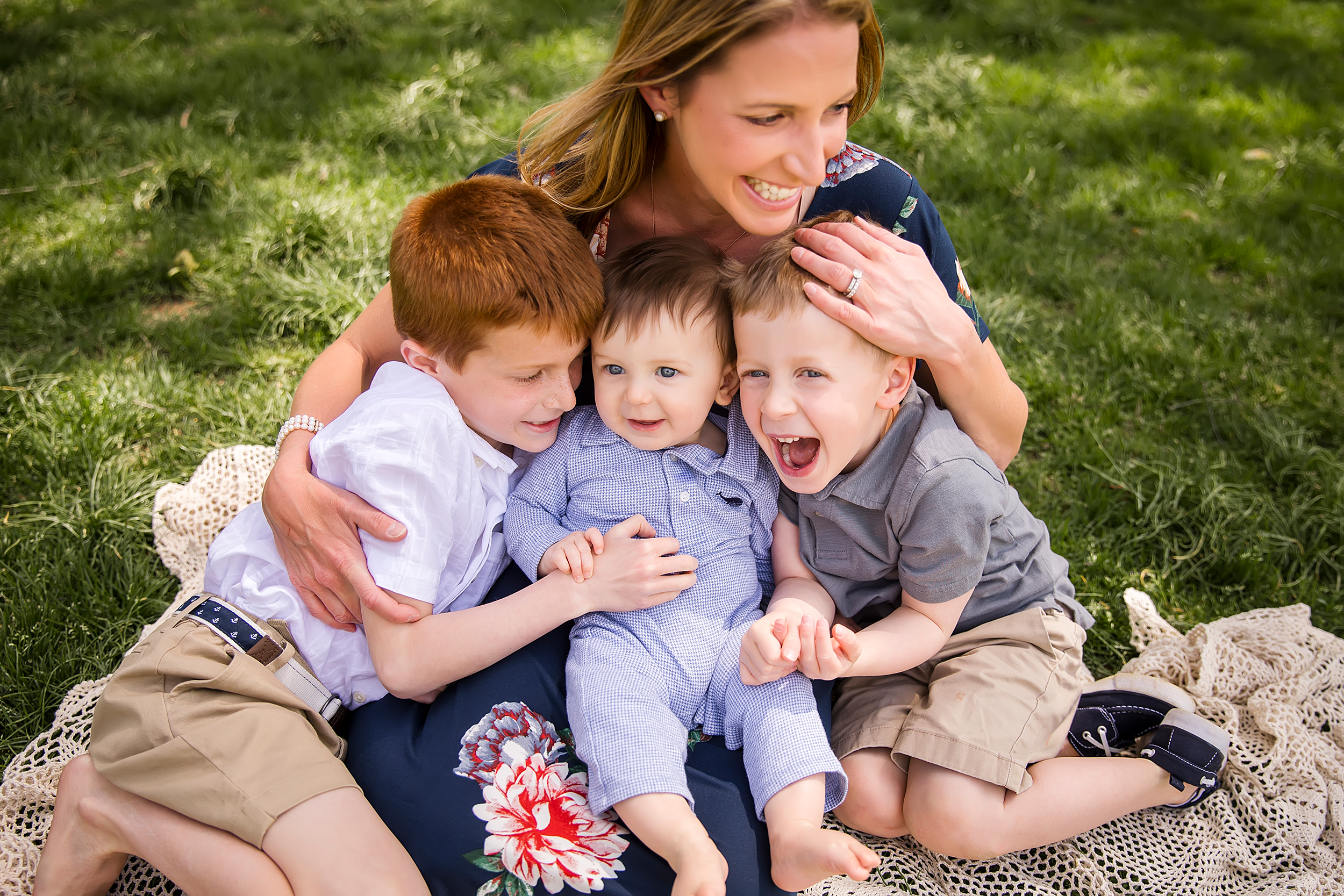 mother holding her three little boys, CT Family Photographer