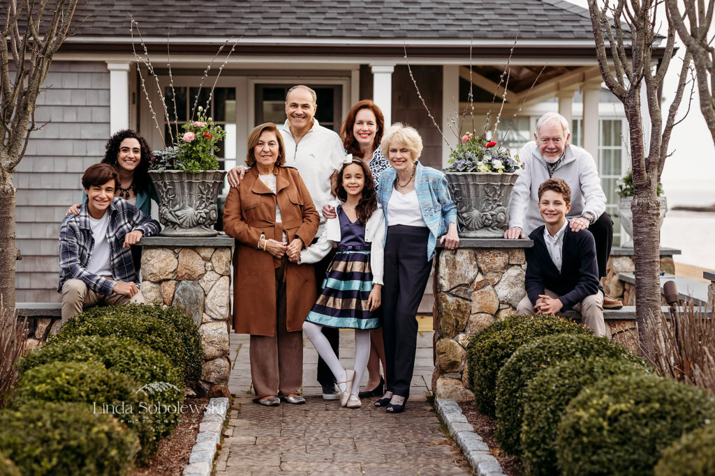 large family sitting outside their home, Old Lyme CT Family photographer