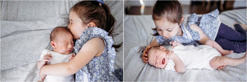little girl in blue dress kissing her baby brother, Hamden CT newborn photographer