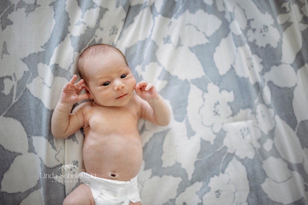 newborn baby boy in diaper, Hamden and New haven CT Family photographer