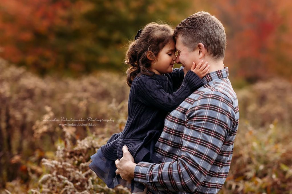 little girl hugging her daddy, Favorite dad images for CT shoreline photographer