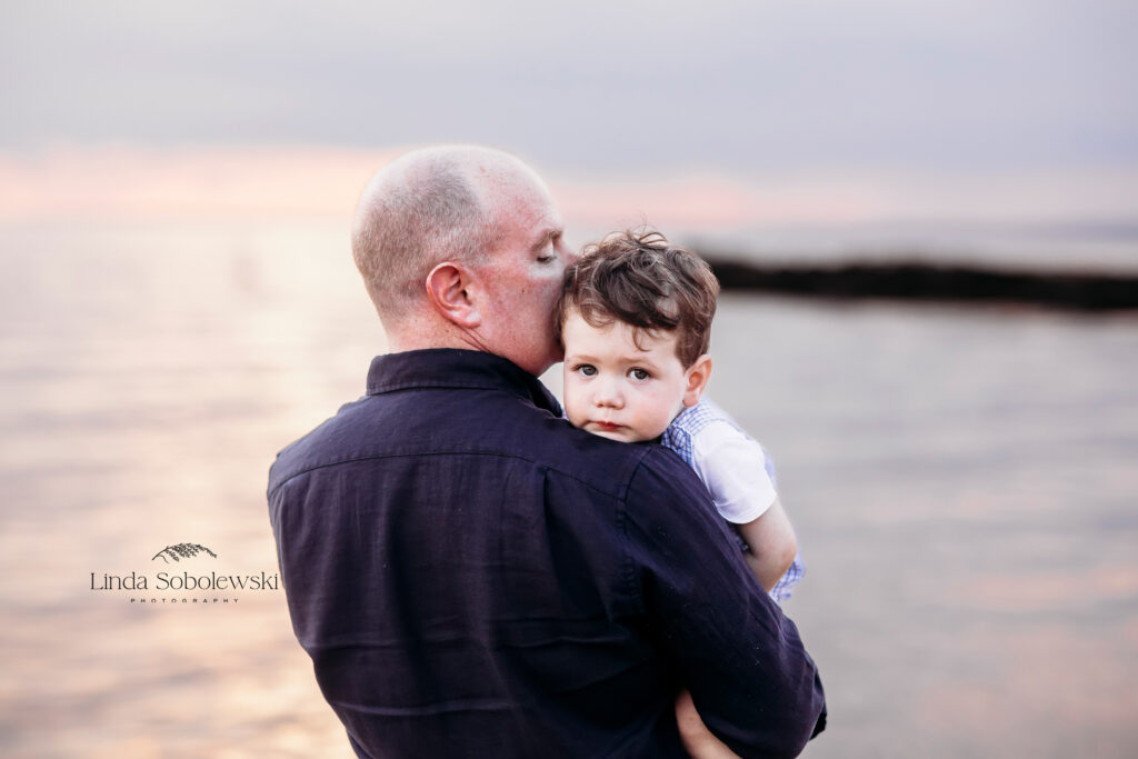 2 year old boy being held by his dad, CT Best family photographer, 2022 Session Superlatives