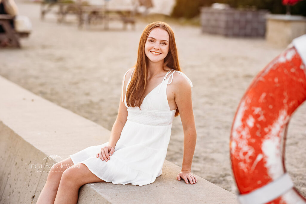teenage girl in white dress at the beach, Guilford CT Senior photographer