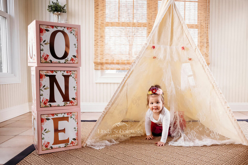 little baby in a play tee-pee, Photos for Baby's First Birthday with CT Baby photographer