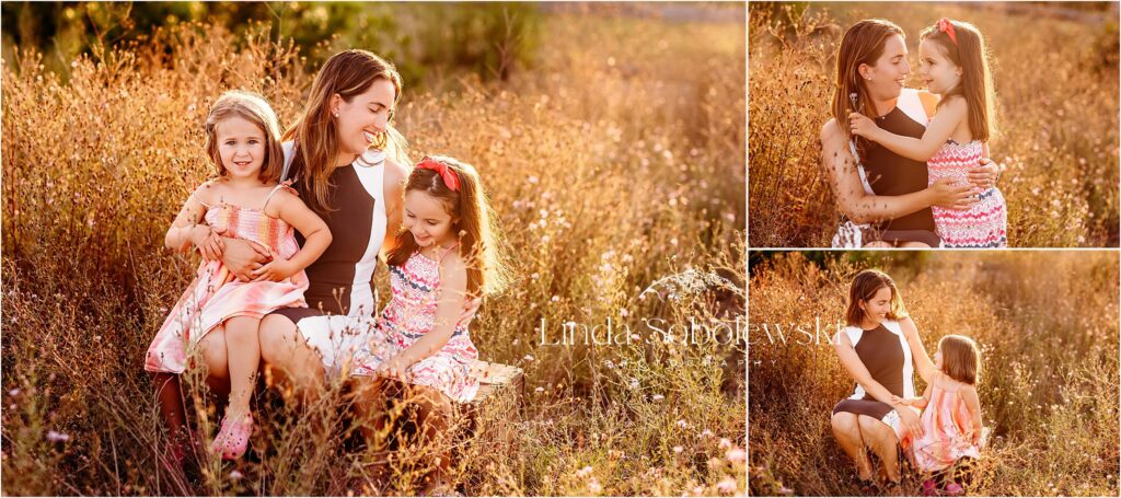 mother sitting with her two little girls in a field, Old Saybrook, CT photographer