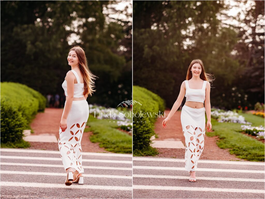 girl in long white dress walking across the street, CT Senior photographer