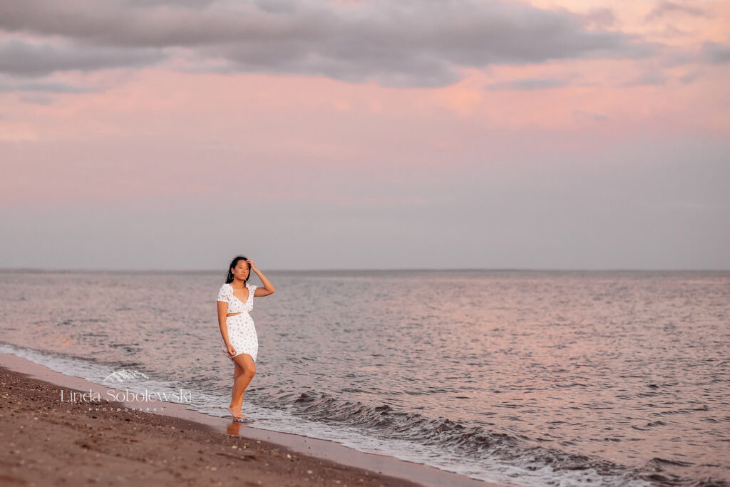 girl walking on the beach at sunset, Old Saybrook photgrapher