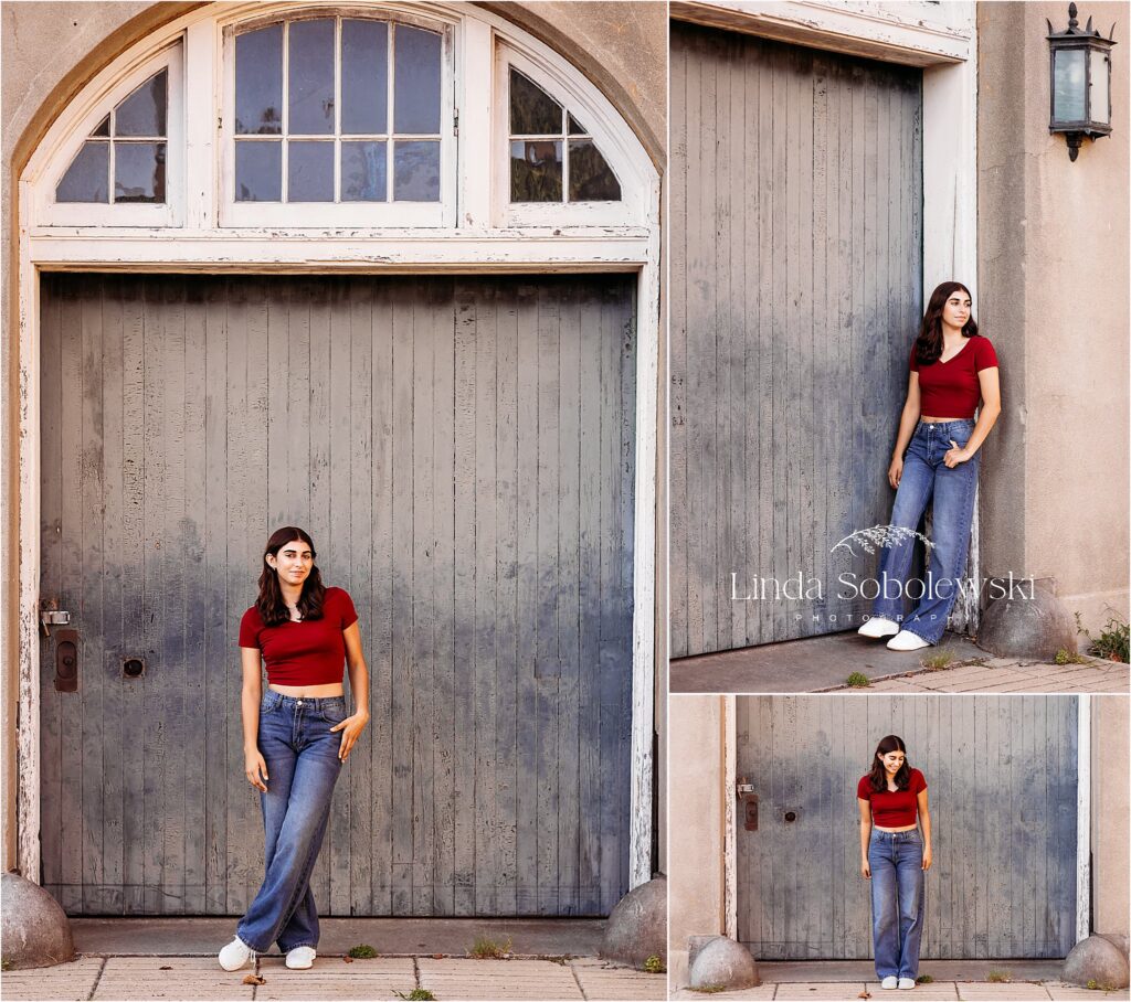 girl in red top standing against a green door, CT senior photographer