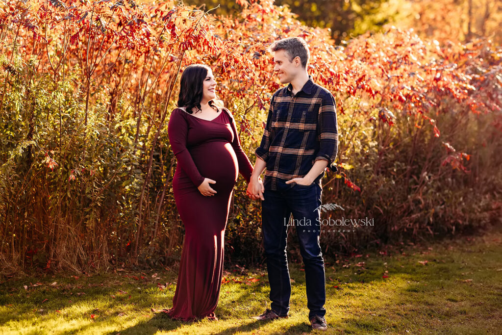 Pregnant women in red dress with her husband, Maternity photographer n CT