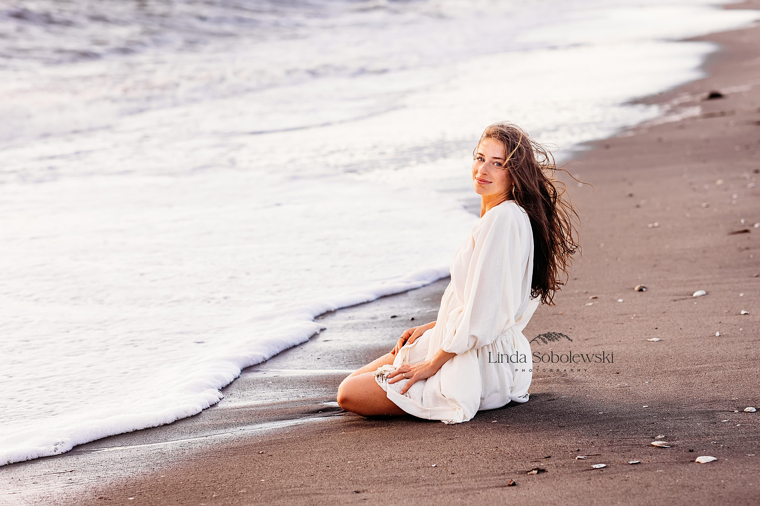 teenage girl in white dress at the beach, CT shoreline senior photographer