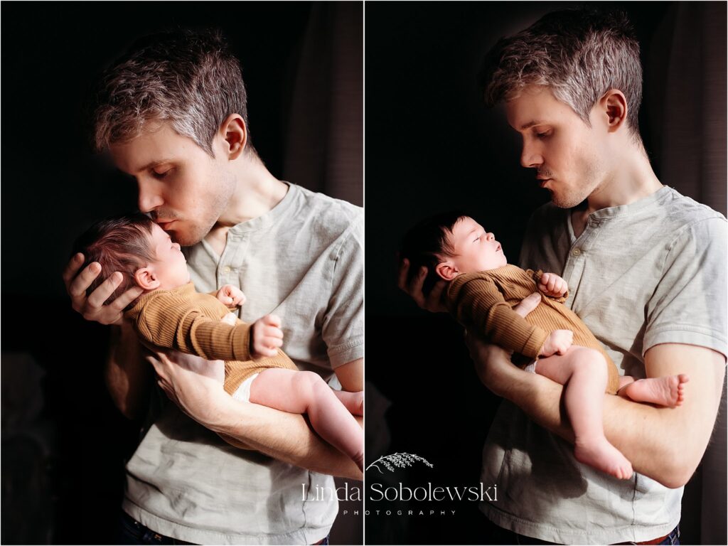new father holding his newborn baby boy, Best newborn photographer in CT