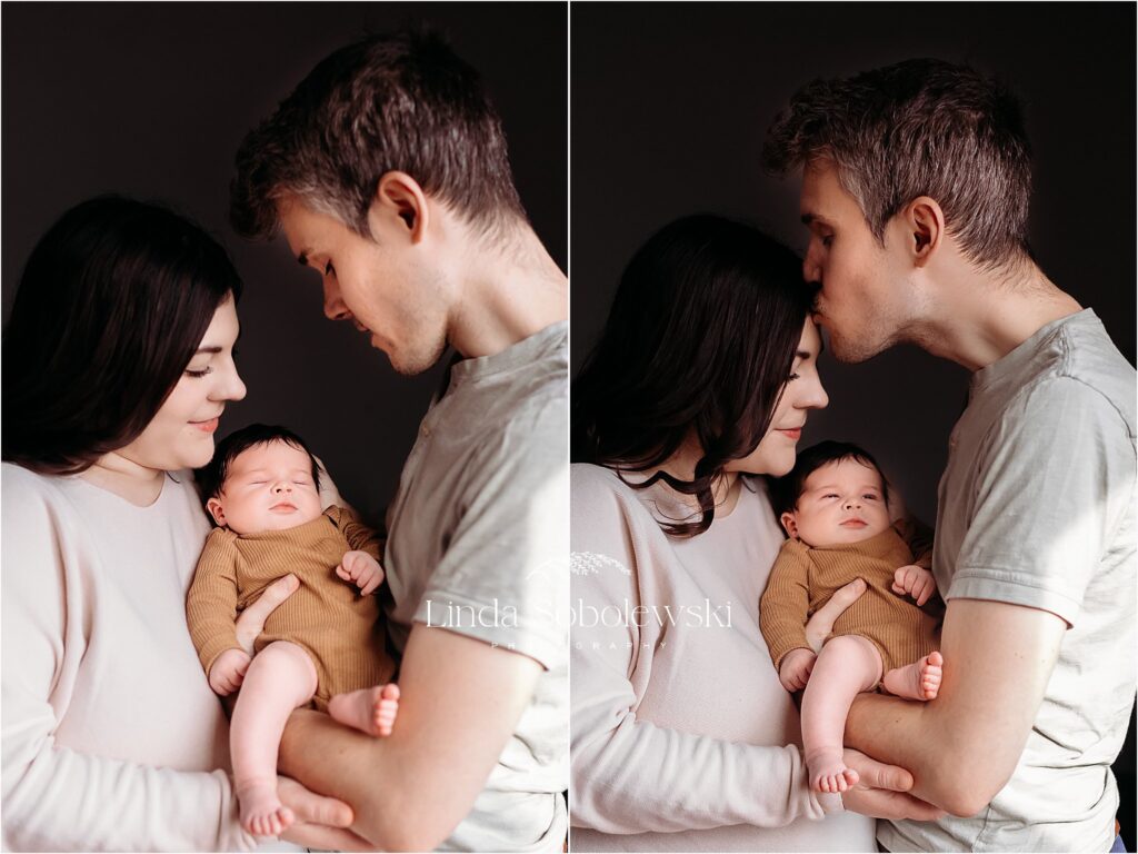 mother and father holding their newborn baby, Branford CT newborn photographer