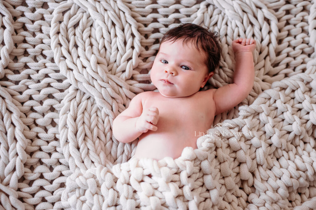 newborn baby laying on a blanket, baby photographer in CT shoreline