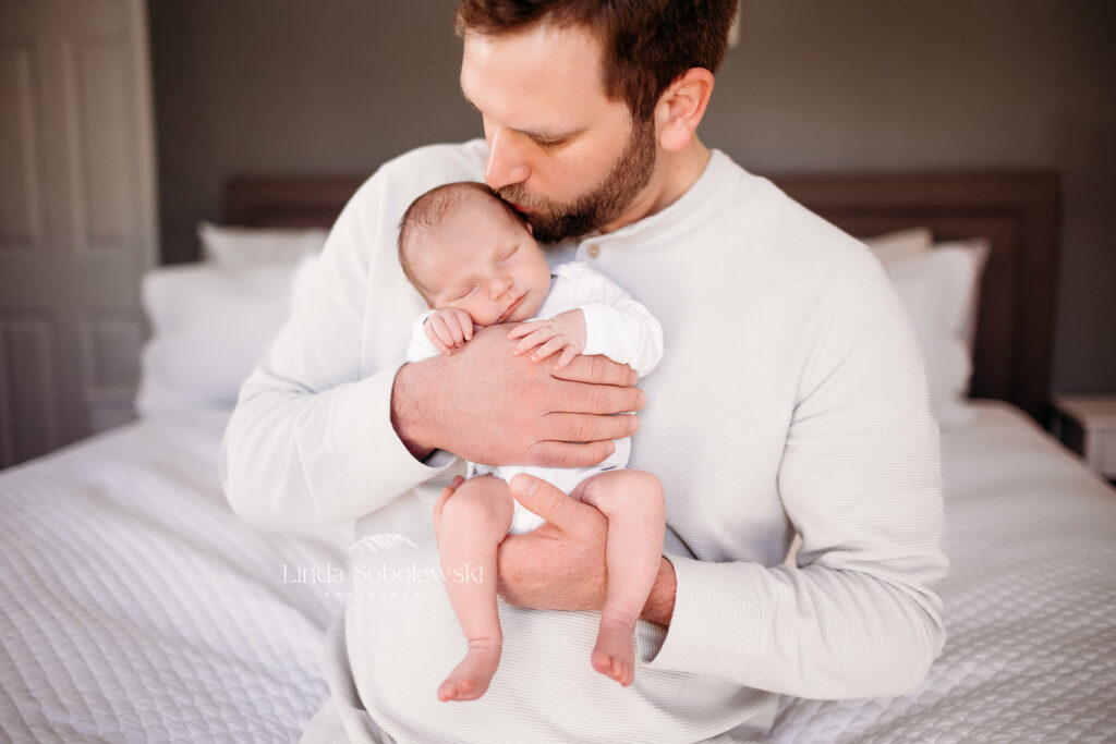 dad holding his newborn baby girl, Favorite dad images for  CT shoreline best photographers