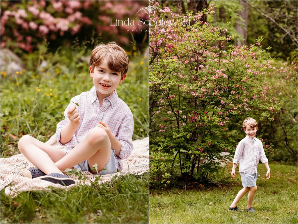 little boy sitting in pink shirt and shorts at the park, CT Family Spring Photo session