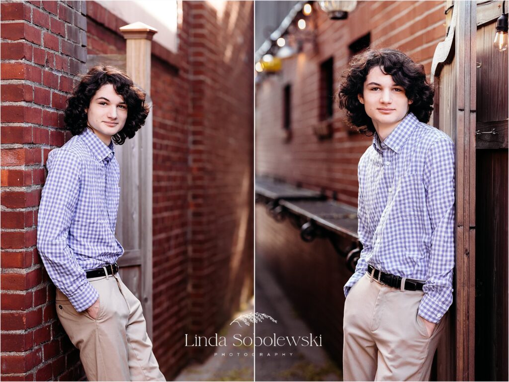 boy in black hair in a brick alley, Senior boy photo session in CT