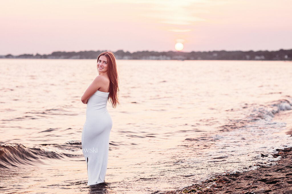 senior girl walking on the beach, Old Saybrook CT senior photographer