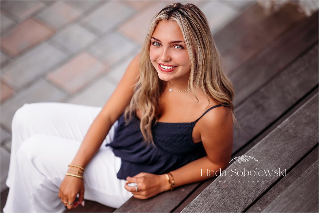 girl in blue tank top sitting on steps, Connecticut Senior Photographer