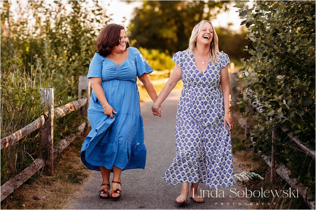 two sisters laughing together, CT senior photographer