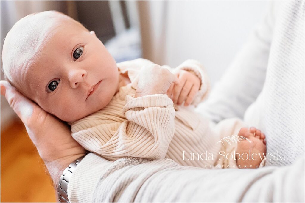 newborn baby in mother's lap, CT Newborn photo session