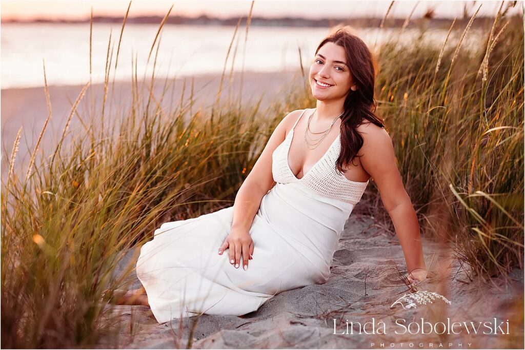 A dreamy beachside senior session in Madison, CT, capturing soft, natural light and the beauty of the shoreline.