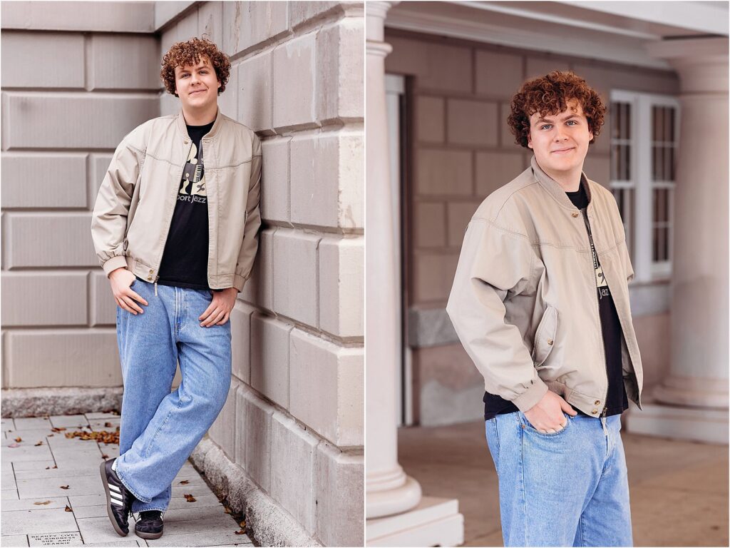 Senior guy leans casually against a modern building with neutral tones, captured during his senior photography session in Old Saybrook, CT