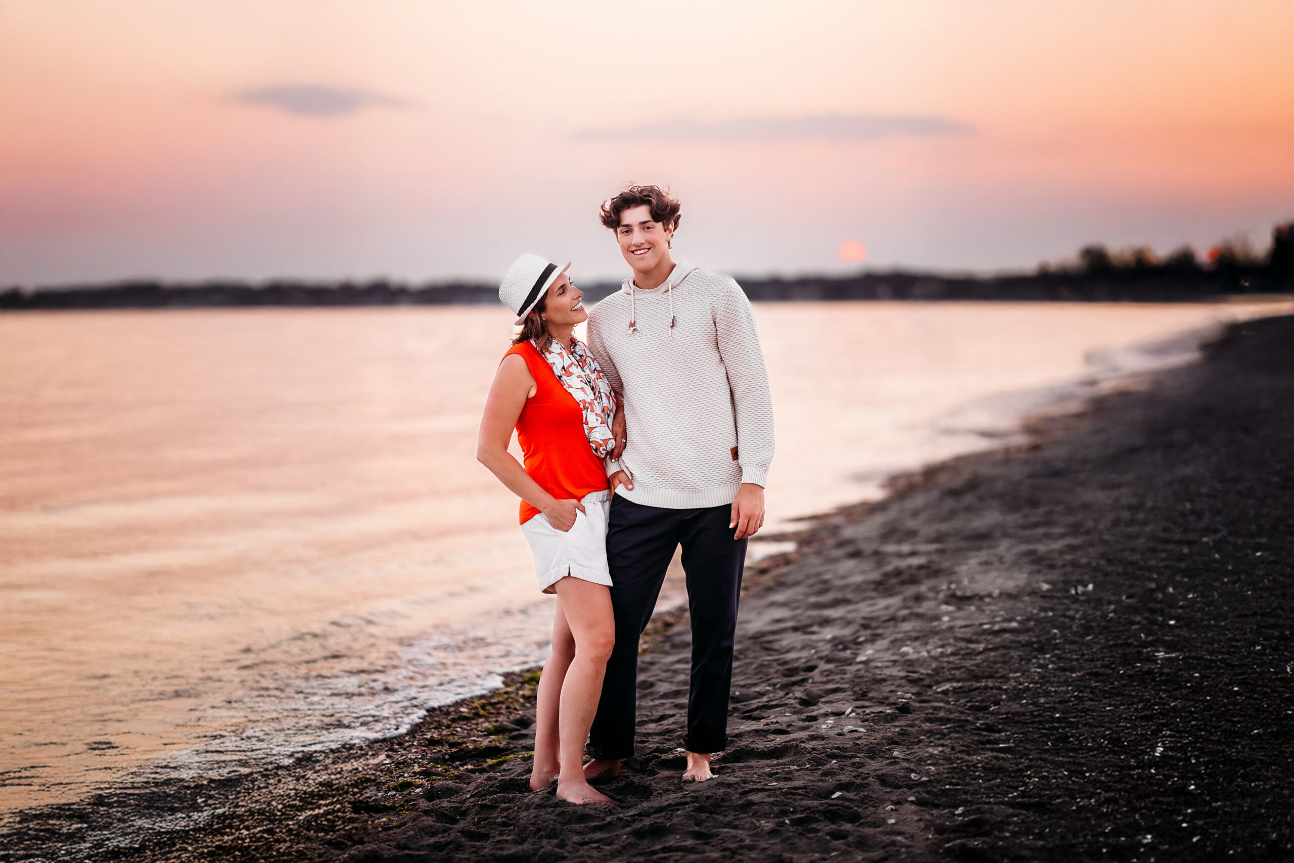 teenage boy and his mom standing at the beach, CT Best senior photographer