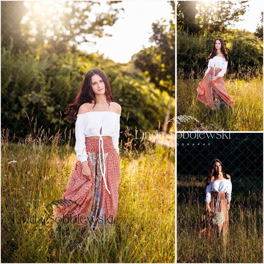 Senior girl standing in a sunlit field wearing a flowy red skirt and white off-the-shoulder top — CT Senior Photographer