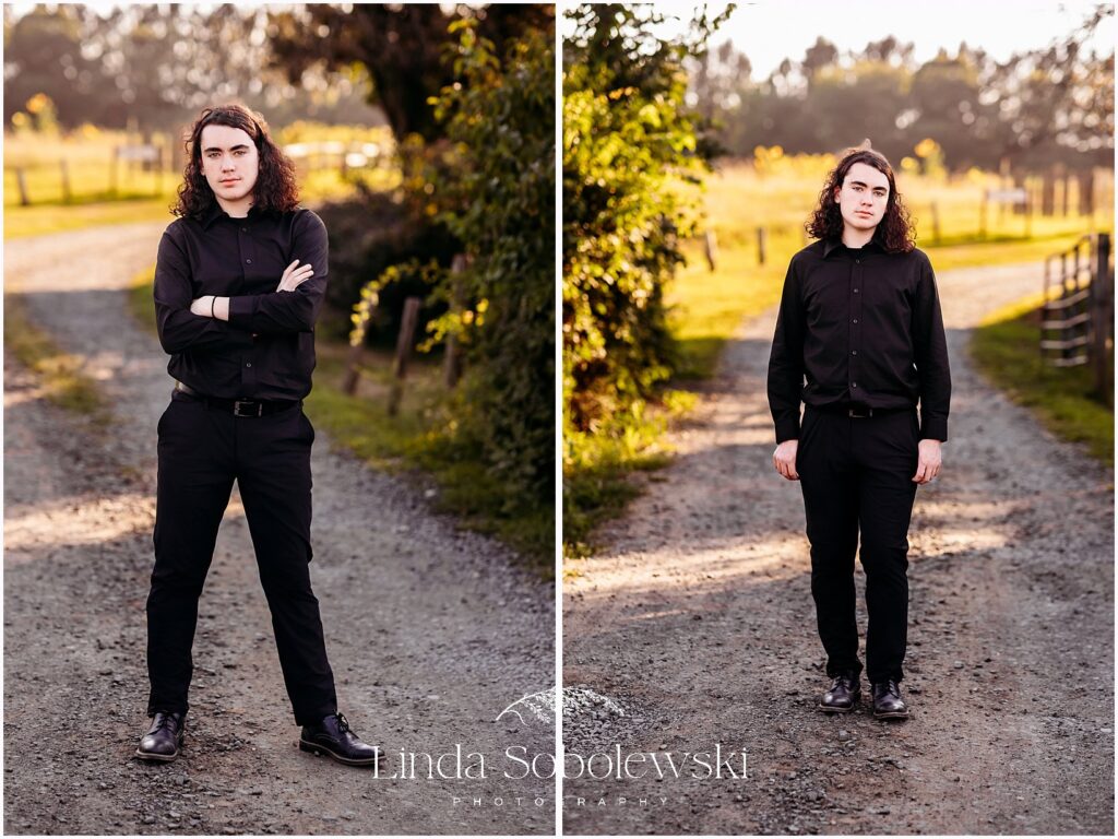High school senior boy wearing all black posing outdoors with moody fall tones and soft natural light, Connecticut senior photographer