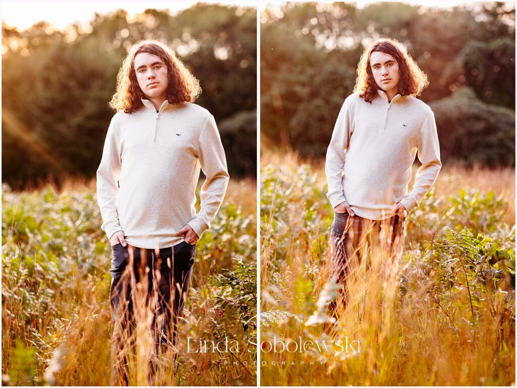 Senior boy portraits in Connecticut with a confident teenage boy photographed in an open field during golden hour, Best CT senior photographer