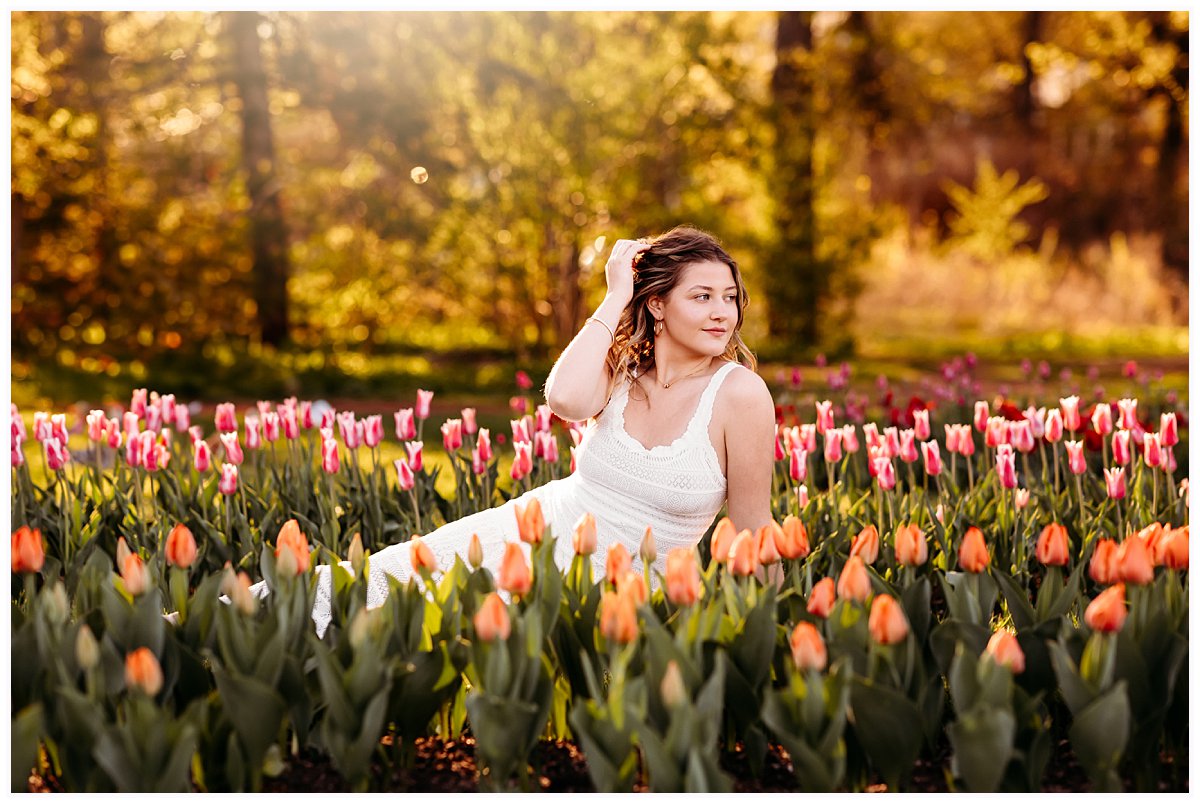 senior photos at Elizabeth Park tulip field, white lace dress golden hour
