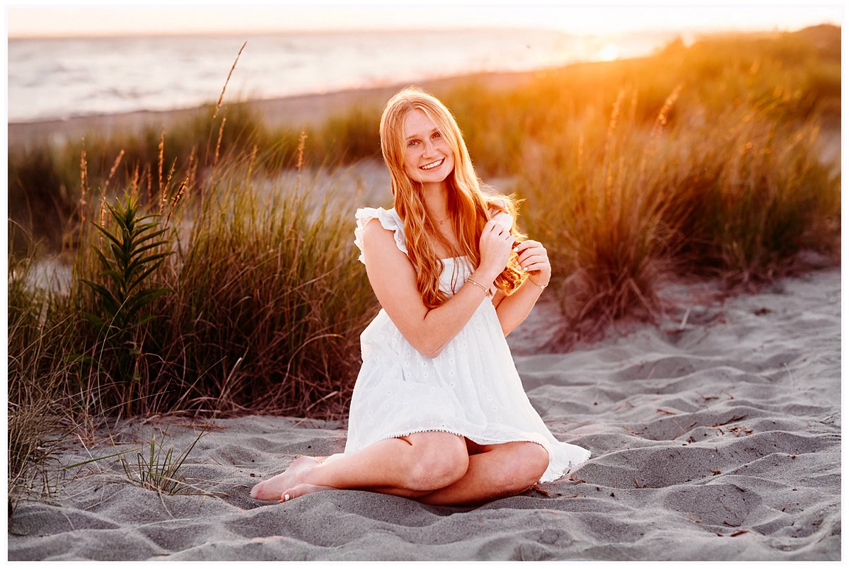girl in white dress at the beach with a Connecticut Senior Portrait Photographer