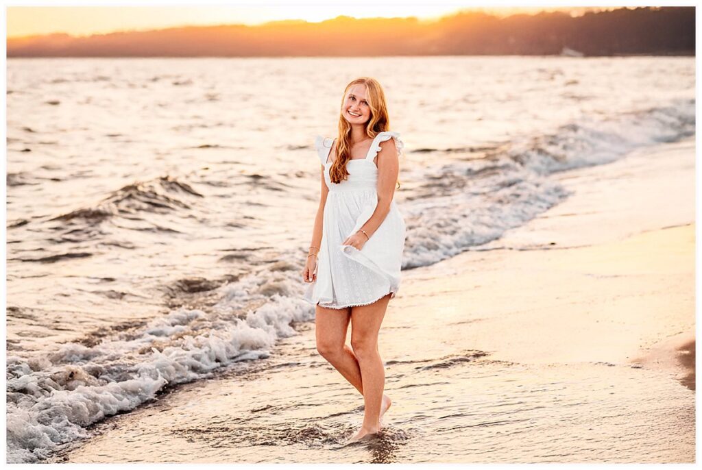 girl in white dress at the beach with a Connecticut Senior Portrait Photographer