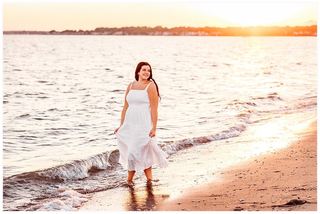 girl in long white dress at the beach for her Connecticut Shoreline Senior Pictures, Madison, CT photographer